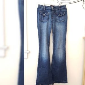 Blue Cult Mid Rise Release Hem Flair Jeans